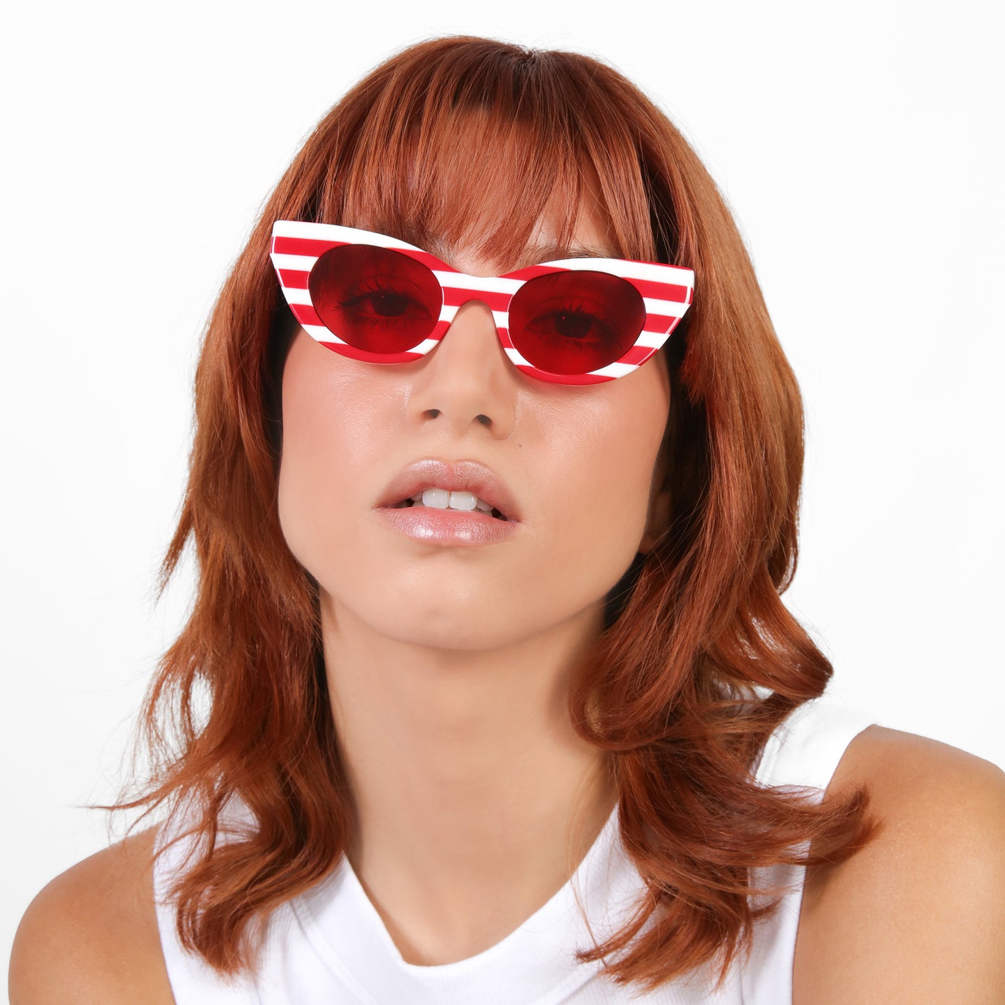 Model wearing Angelica in Red / White Stripes with Red See Through lenses