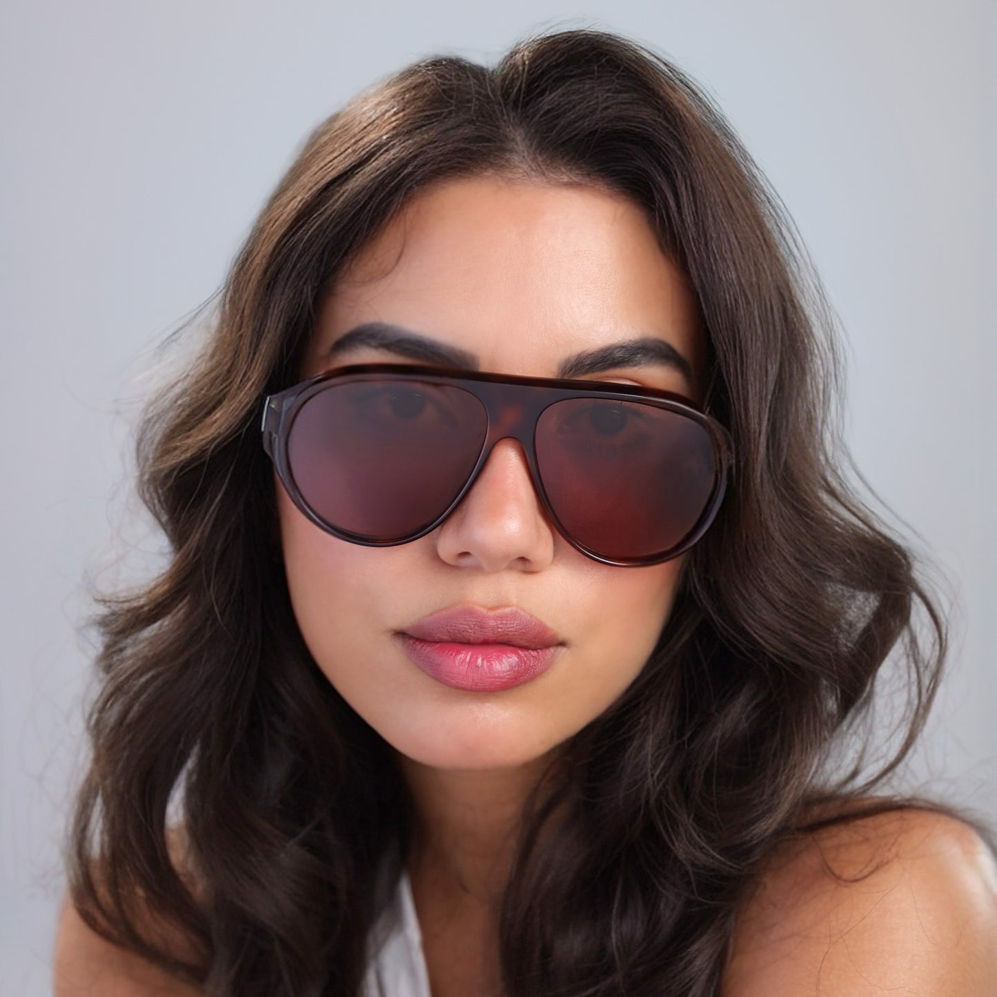 Brunette woman wearing Douglas Sunglasses in Mahogany with brown lenses