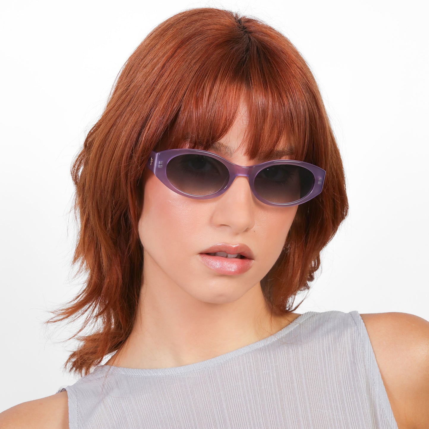 Another angle of model wearing Exumas Sunglasses in Lavender with Grey Gradient lenses
