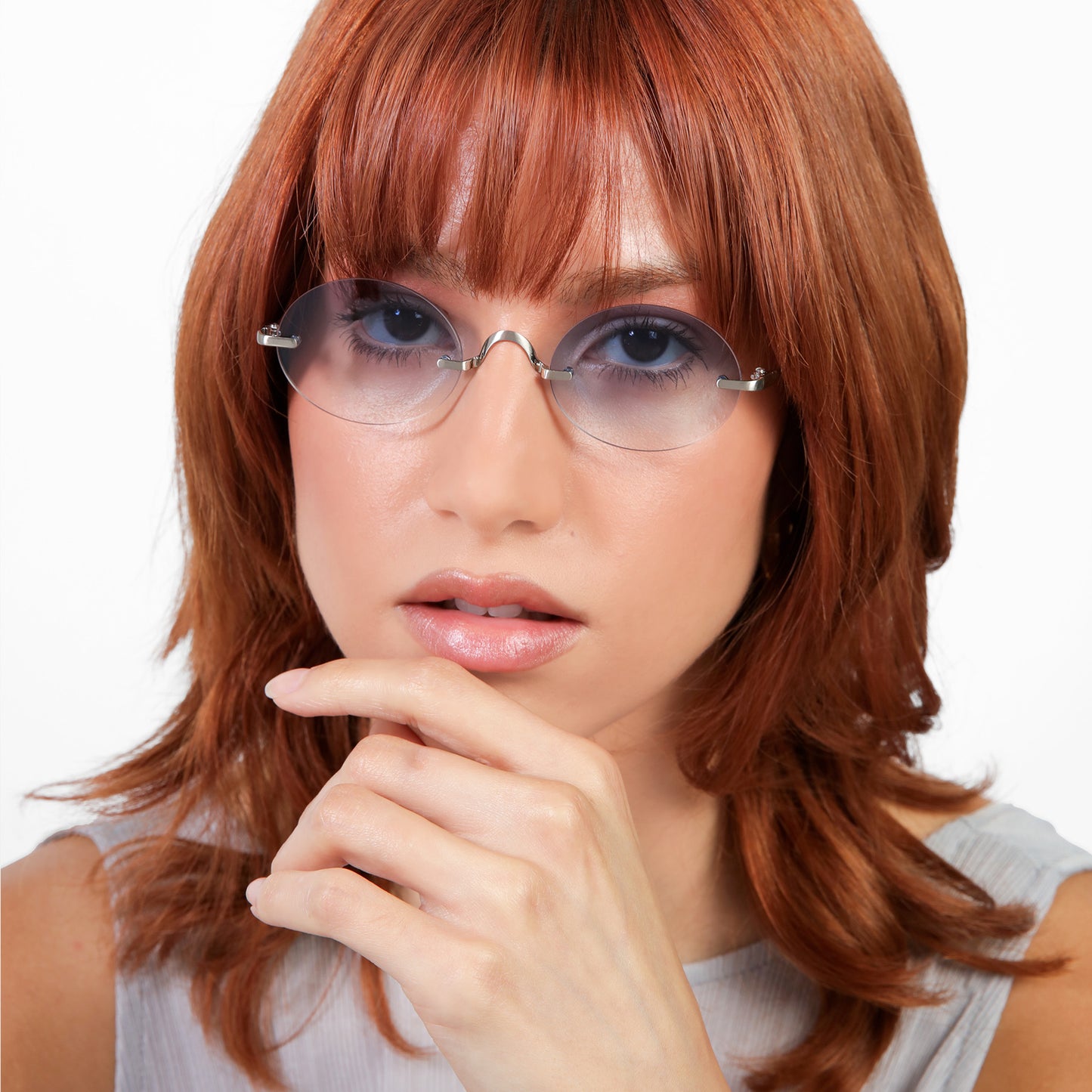 Another angle of model wearing Havana Sunglasses in Silver with Blue Gradient lenses