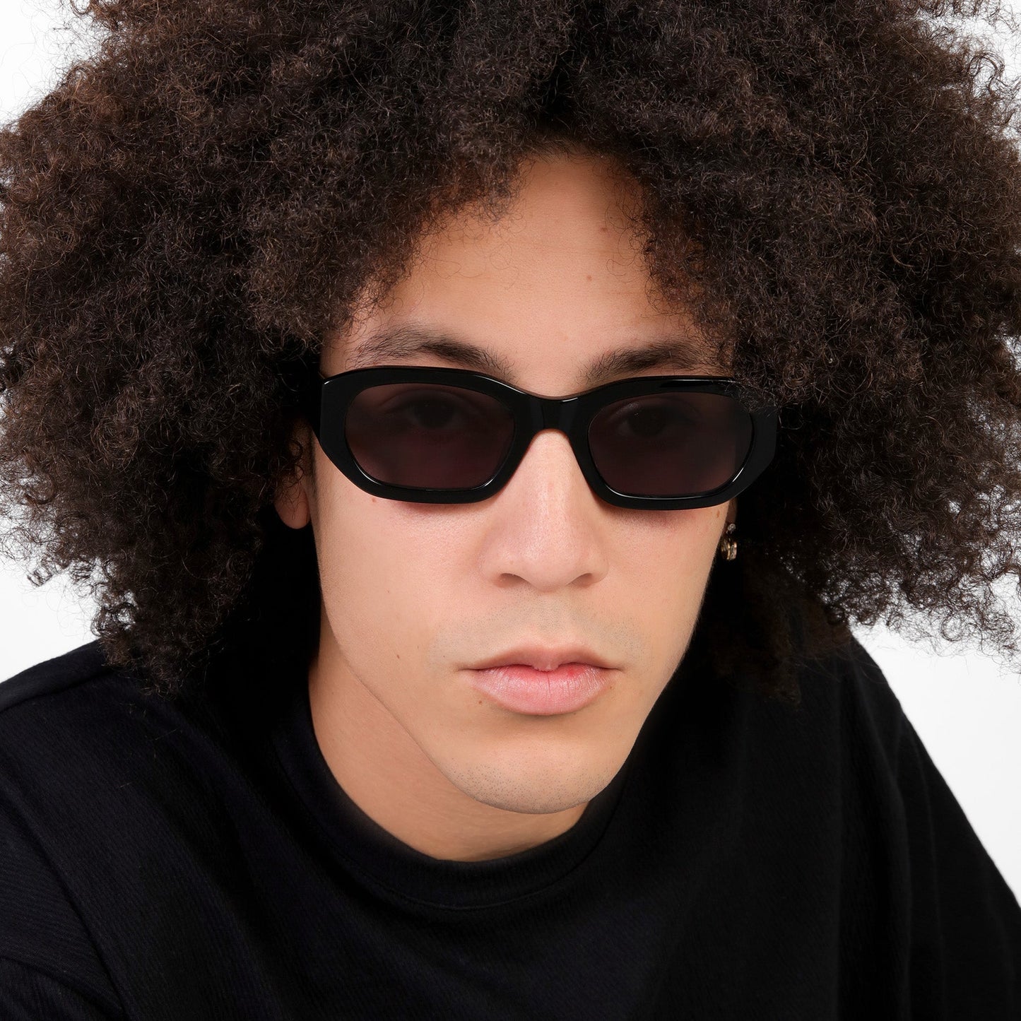 Man wearing La Gorce Sunglasses in Black with Grey lenses