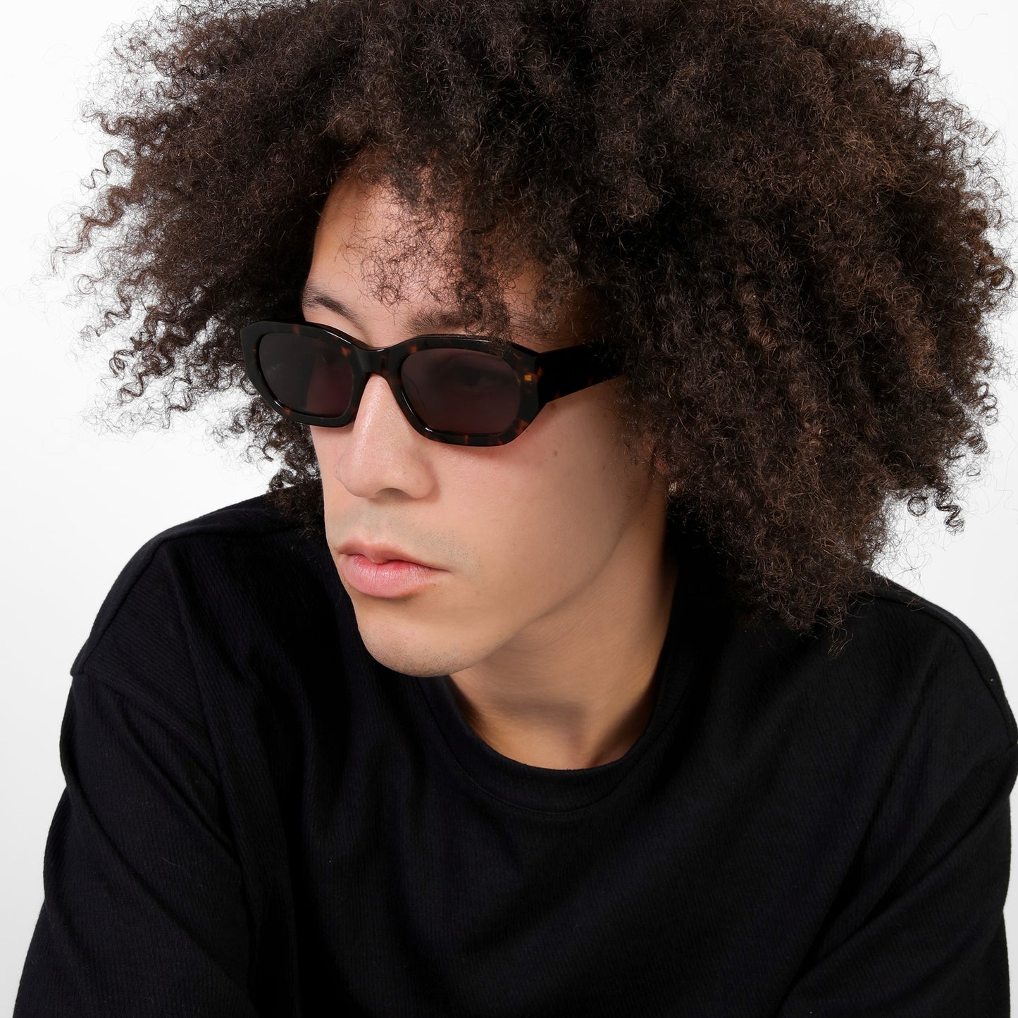 Another angle of man wearing La Gorce Sunglasses in Tortoise with Grey lenses