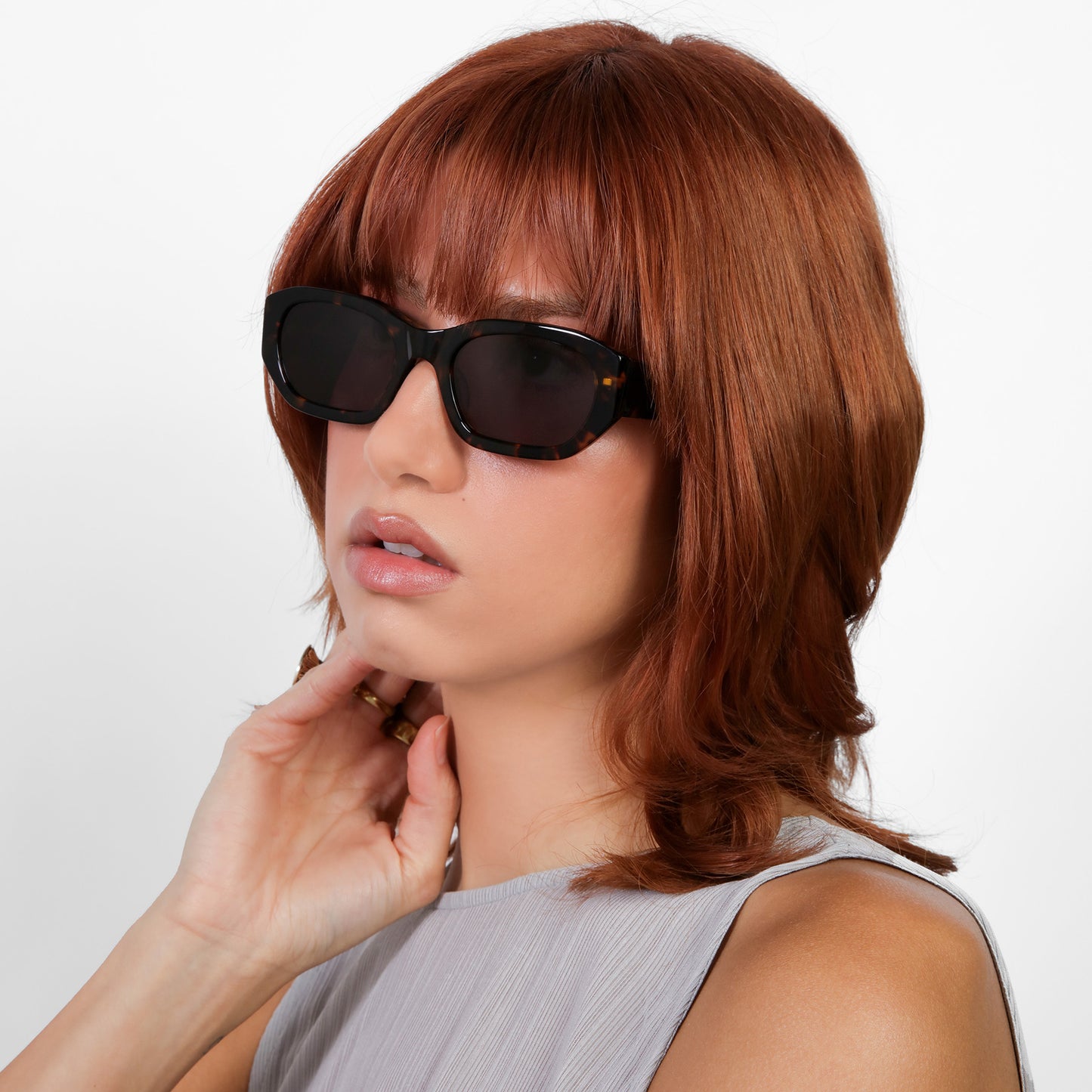 Model wearing La Gorce Sunglasses in Tortoise with Grey lenses