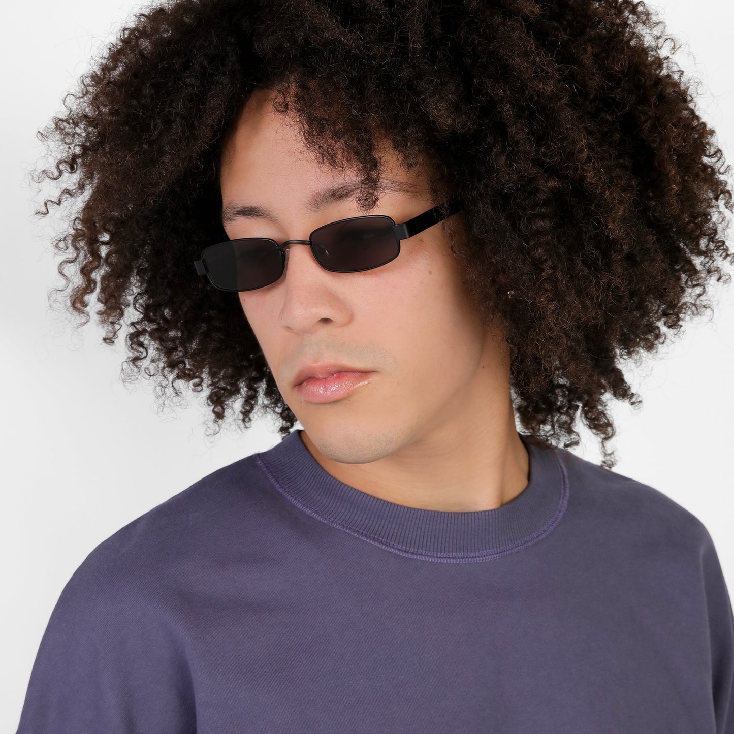Man wearing Shores Sunglasses in Matte Black with Grey lenses