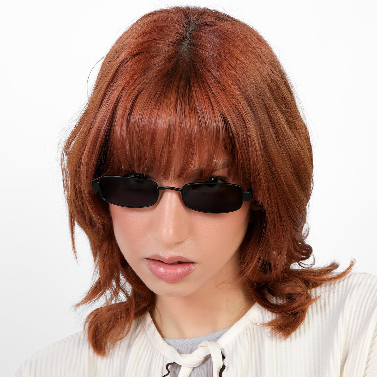 Another angle of model wearing Shores Sunglasses in Matte Black with Grey lenses