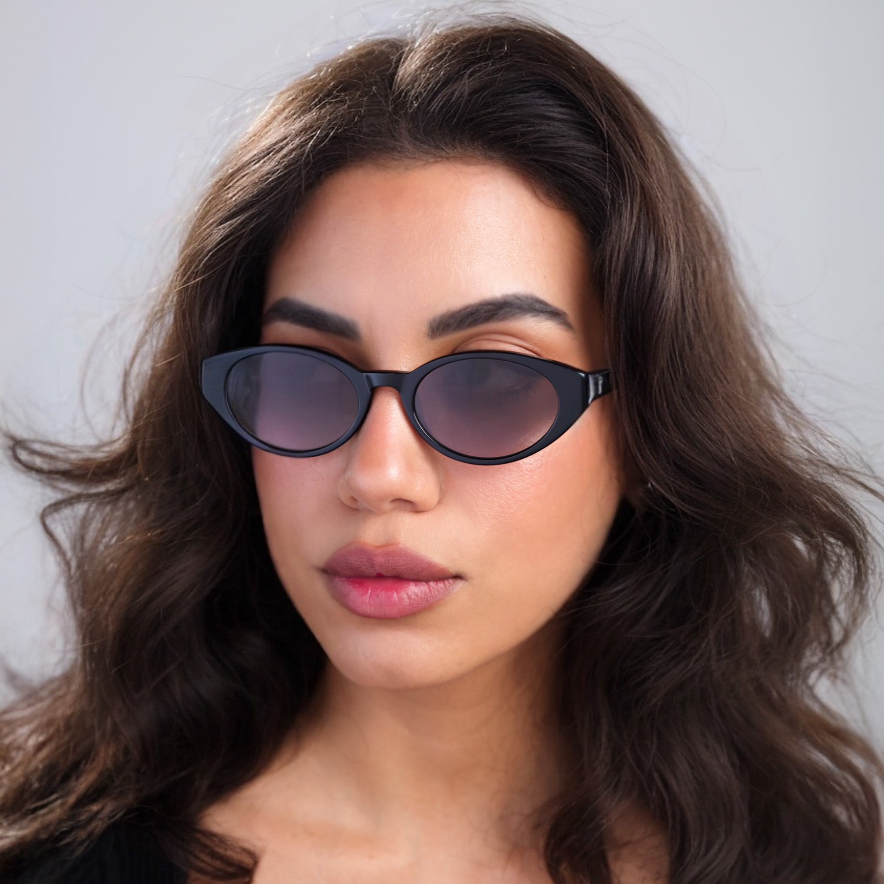 Brunette woman wearing Collins Sunglasses in Black with Grey Gradient