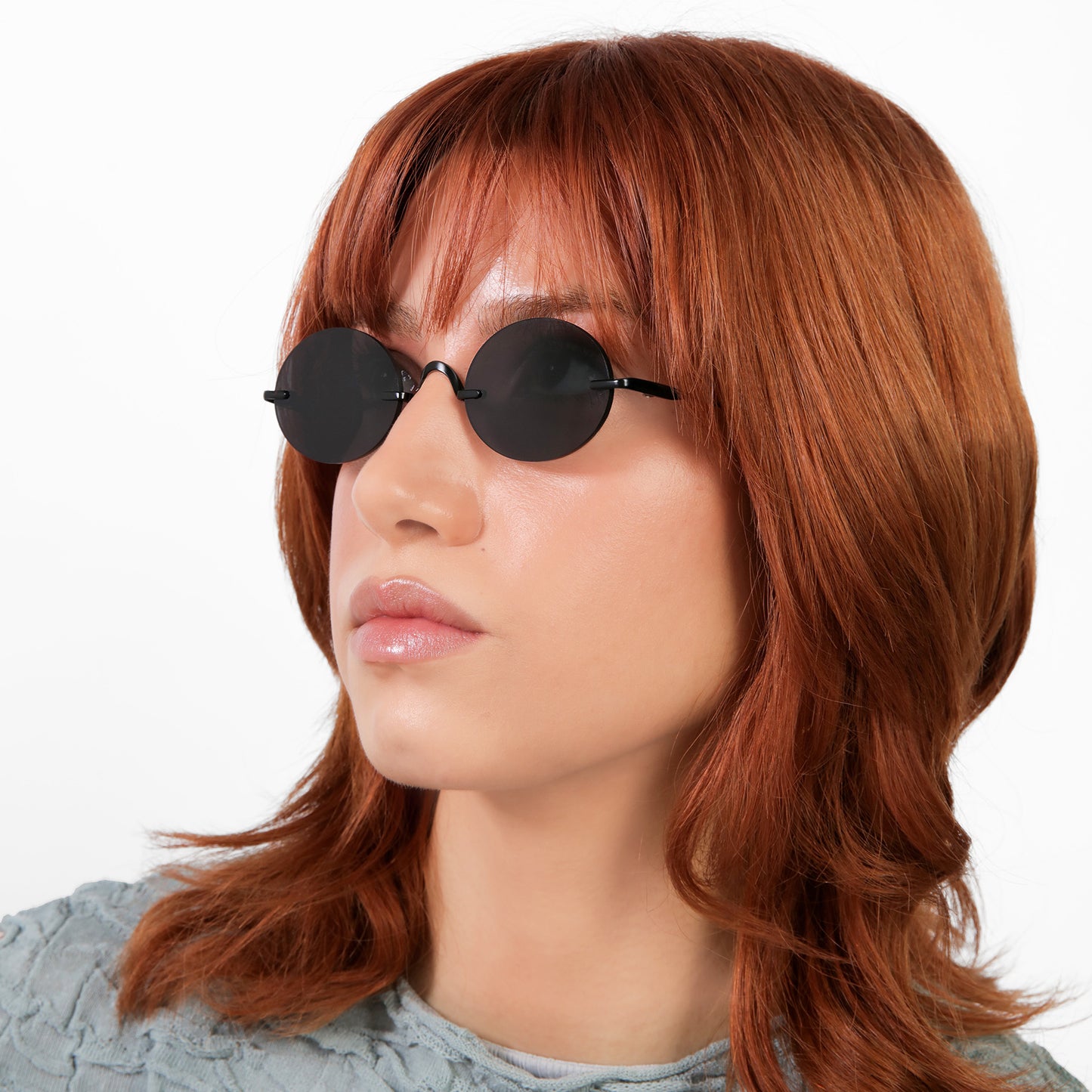 Close up of model wearing Havana Sunglasses