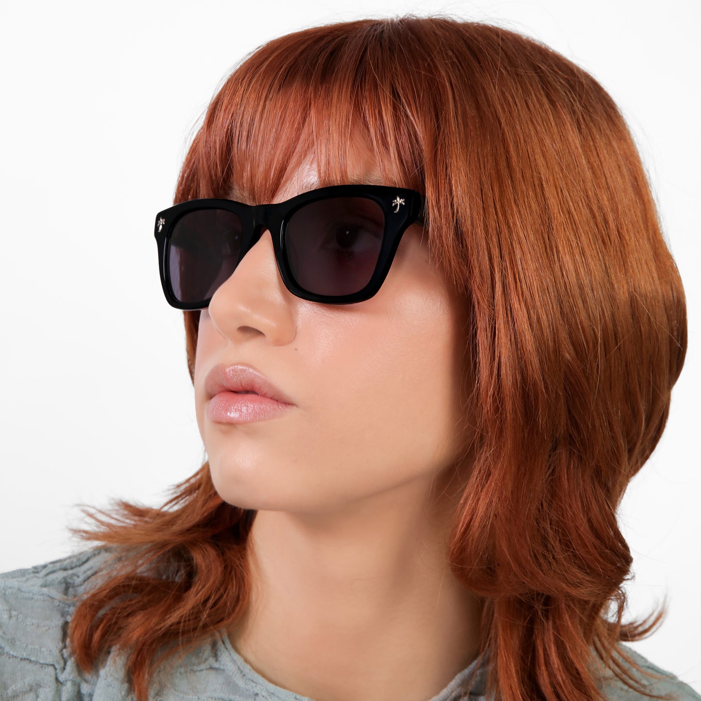 Model wearing Hibiscus Sunglasses in Black with Grey lenses