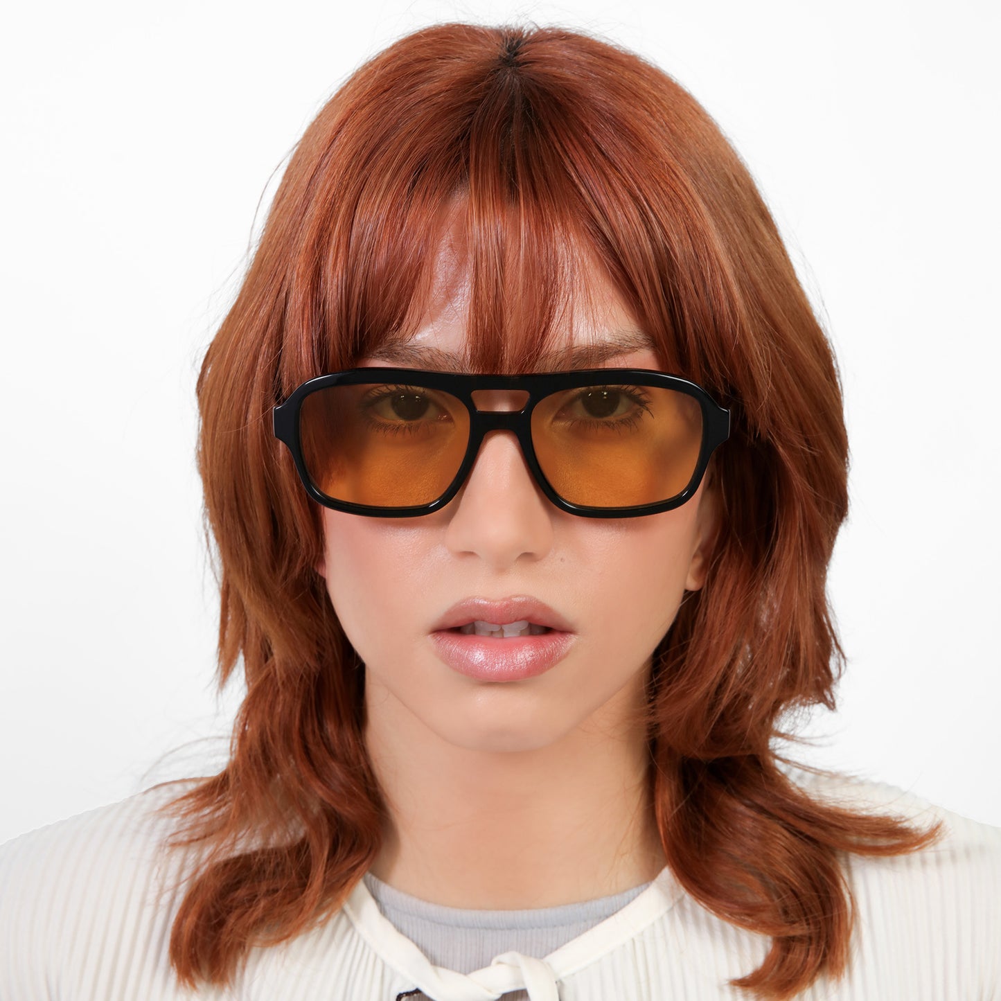 Another angle of model wearing Morningside Sunglasses in Black with Yellow See Through