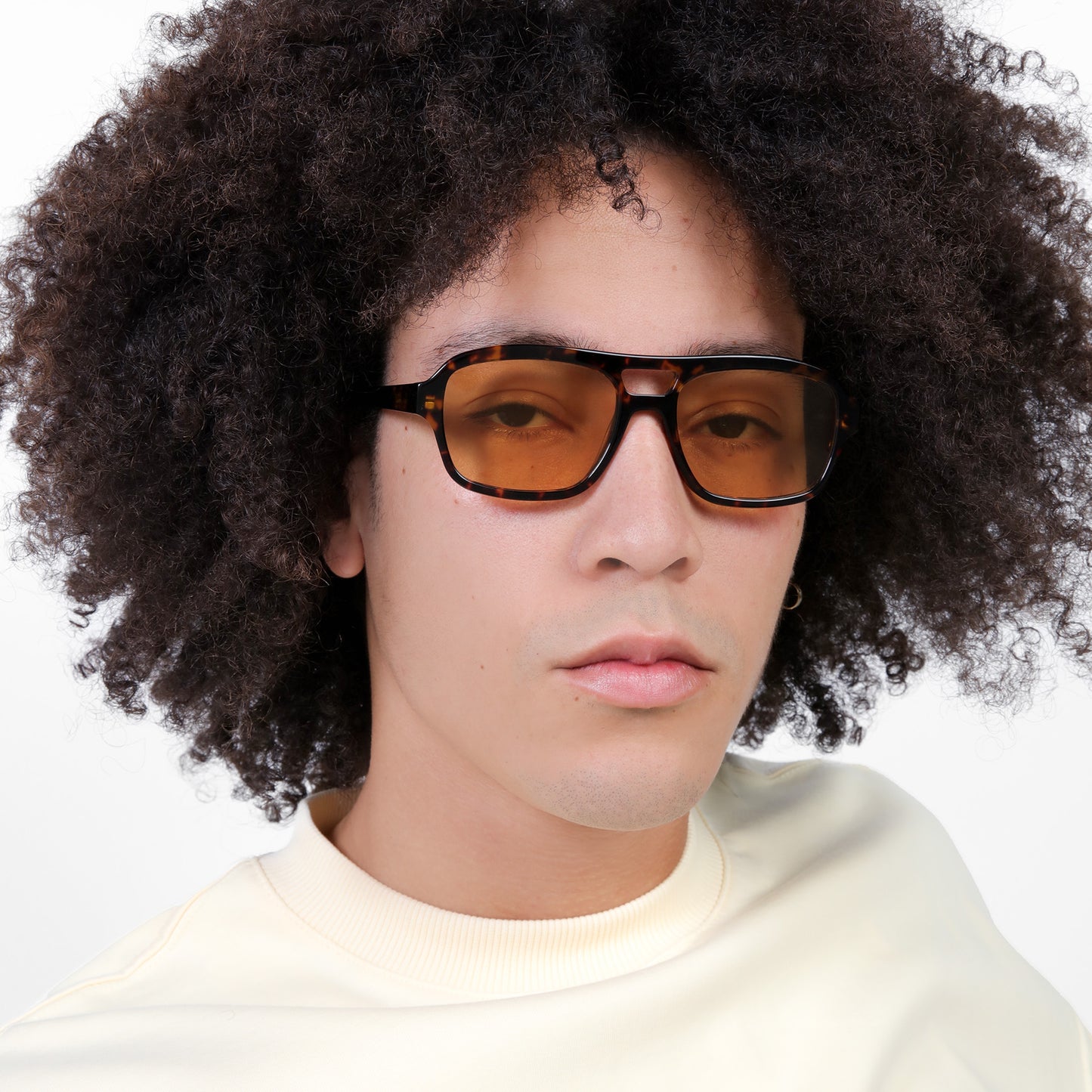 Another angle of man wearing Morningside Sunglasses in Tortoise with Yellow See Through