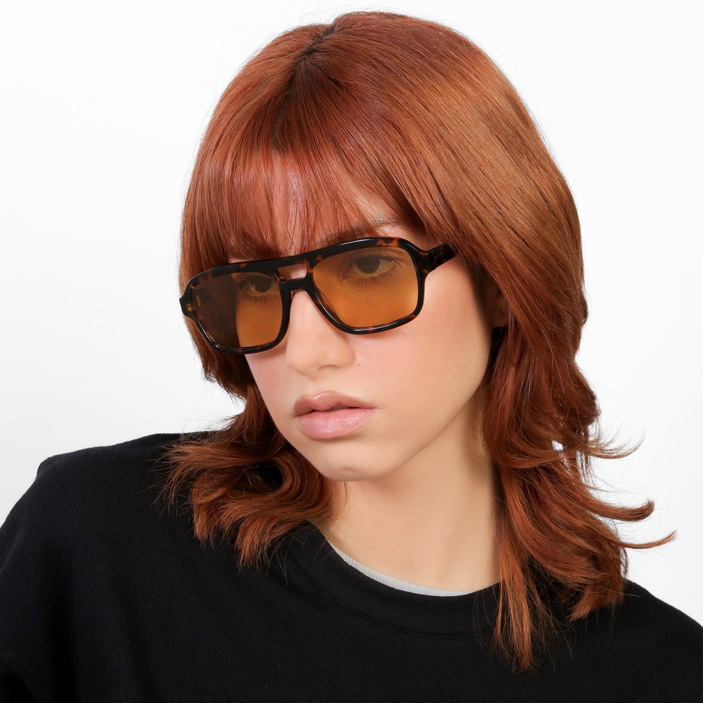 Model wearing Morningside Sunglasses in Tortoise with Yellow See Through